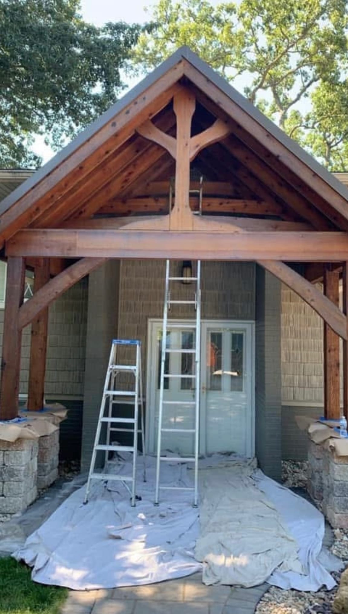 Building entrance with intricate stained wood accents